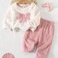 2pcs Baby Girl Casual Comfortable Pink & White Bow Decor Crew Neck Long Sleeve Sweatshirt And Elastic Waist Pants Set.
